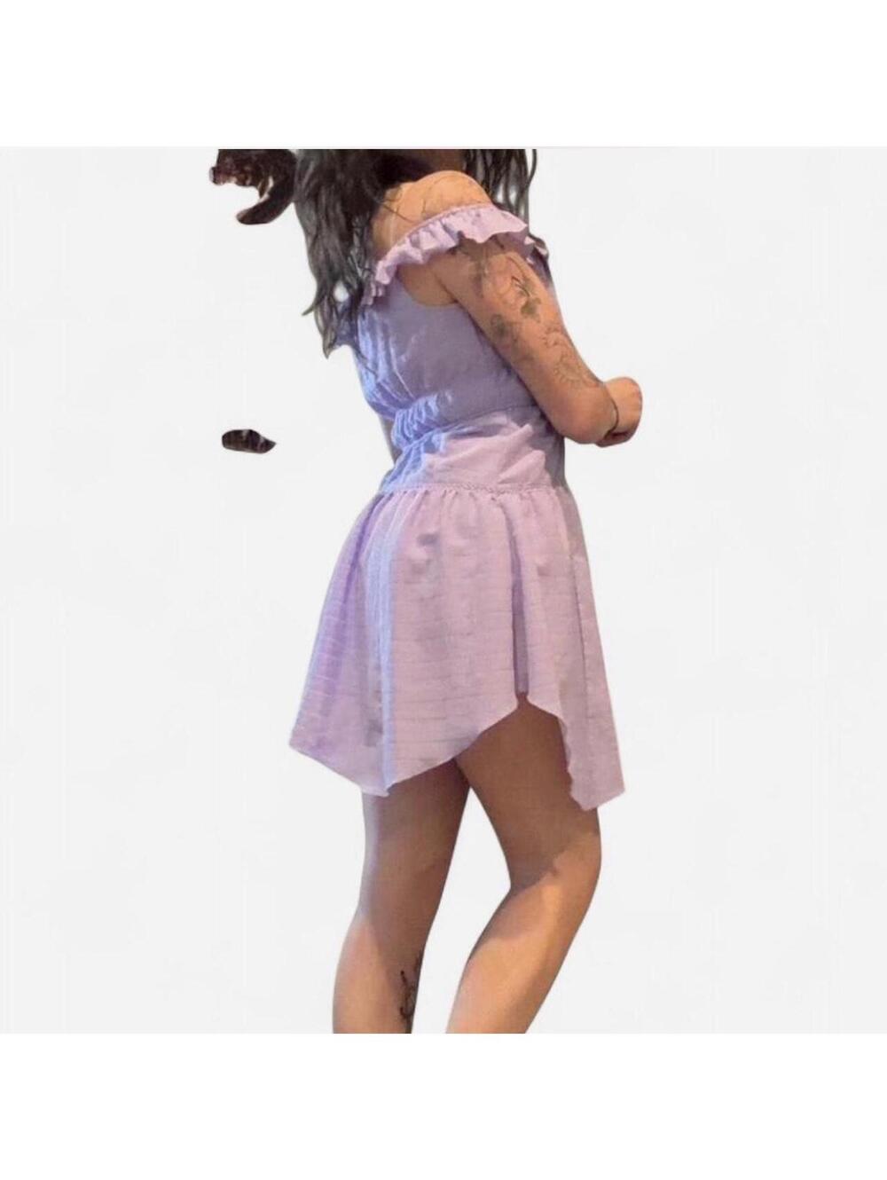 Lilac dress with ruffle details , featuring a flowy, fairy-like style
